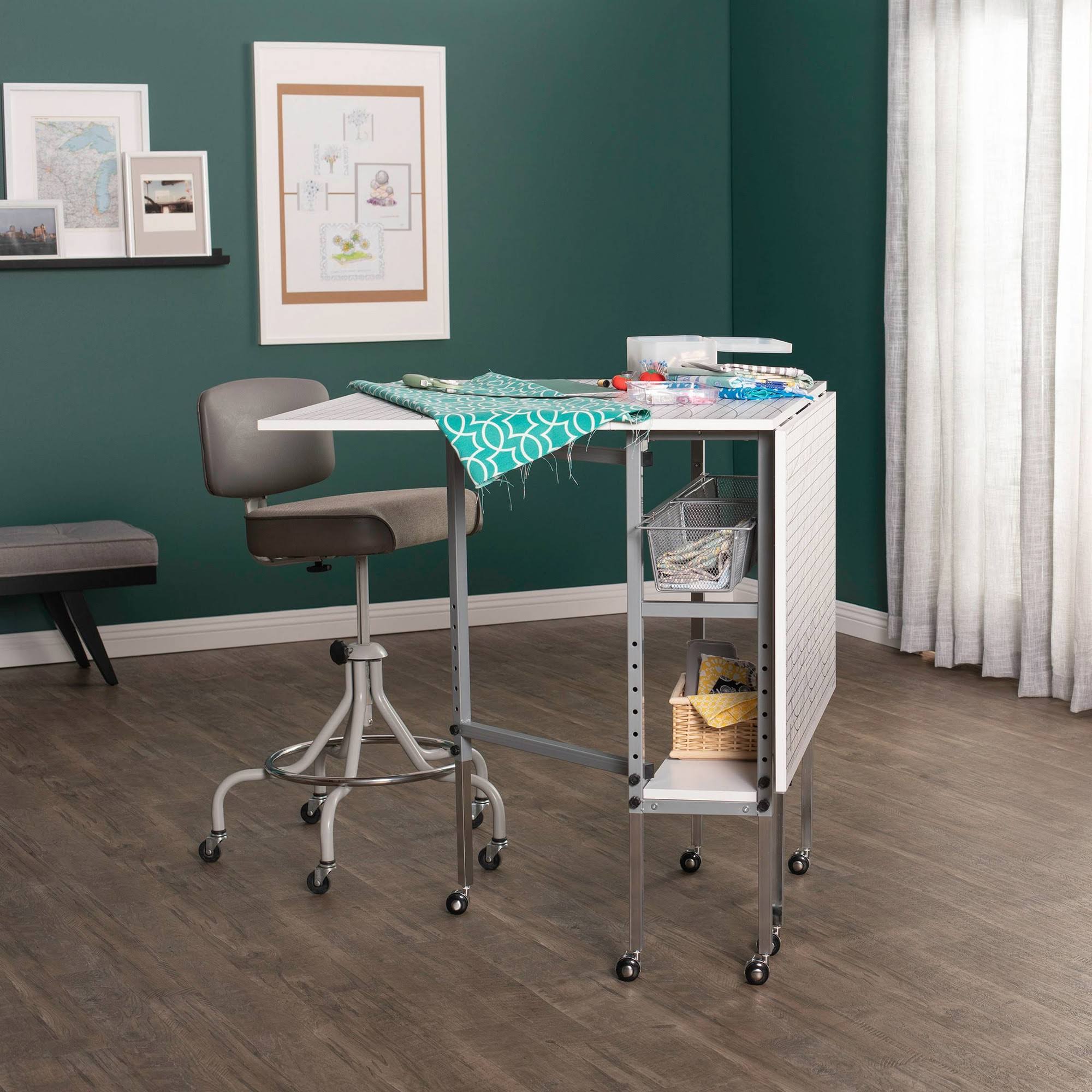 Sew Ready Mobile Folding Height Adjustable Quilting Fabric Cutting Table with Sewing Board Grid and Storage in Silver/White Top - Image 3